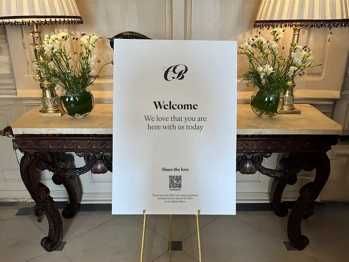 Welcome sign at wedding showing QR Code